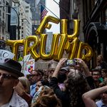 Protesters on 5th Avenue push towards Trump Tower hours before the President was due to arrive back in his Midtown home.<br>